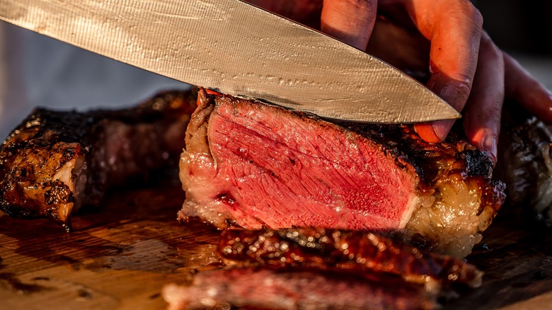 A steak being sliced