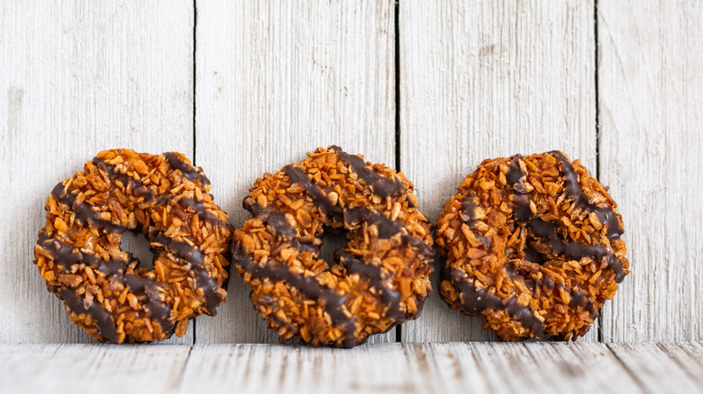 Samoas cookies on wood panels