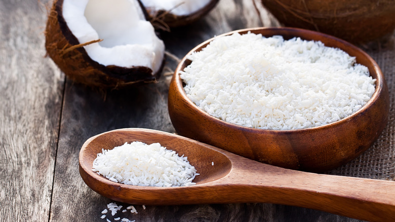 Coconut with bowl and spoon