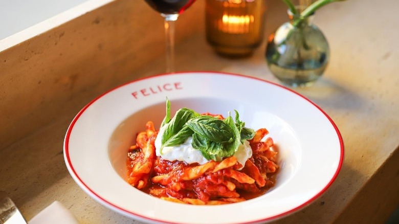 bowl of fusilli with burrata 