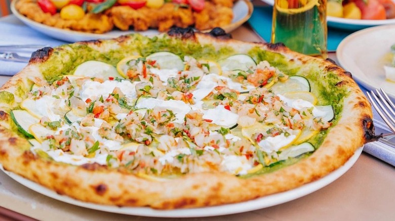 A pizza platter on a table