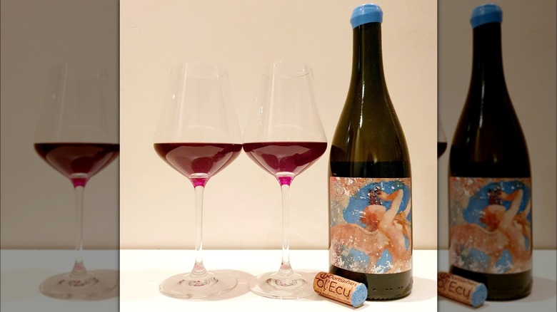 natural wine bottle with glasses