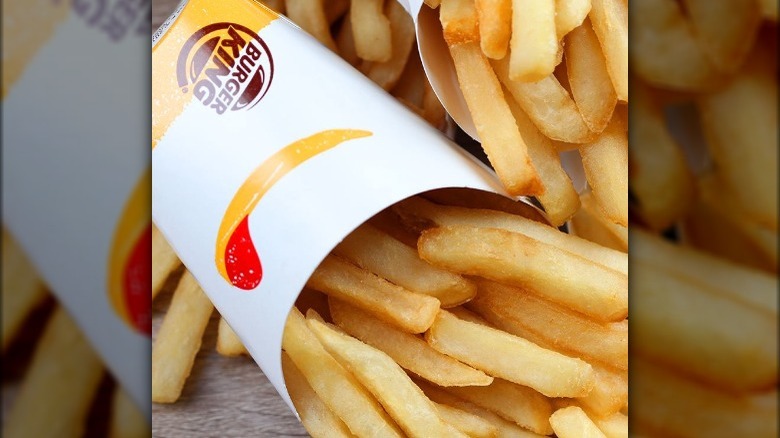 fries spilling out of container