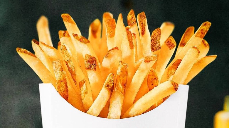 fries in white container