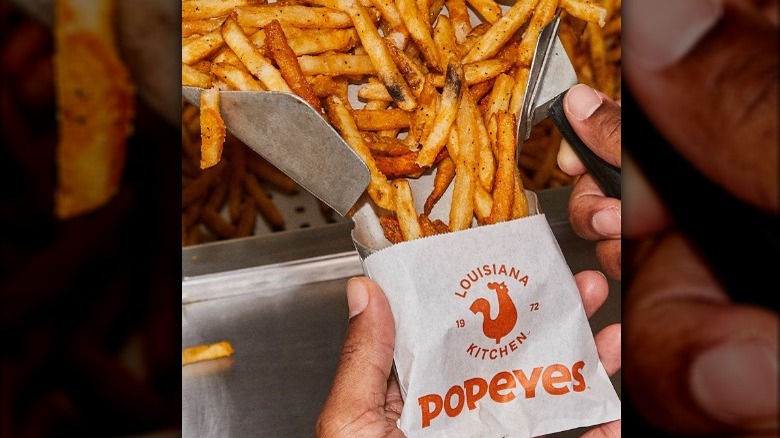 fries funneling into container