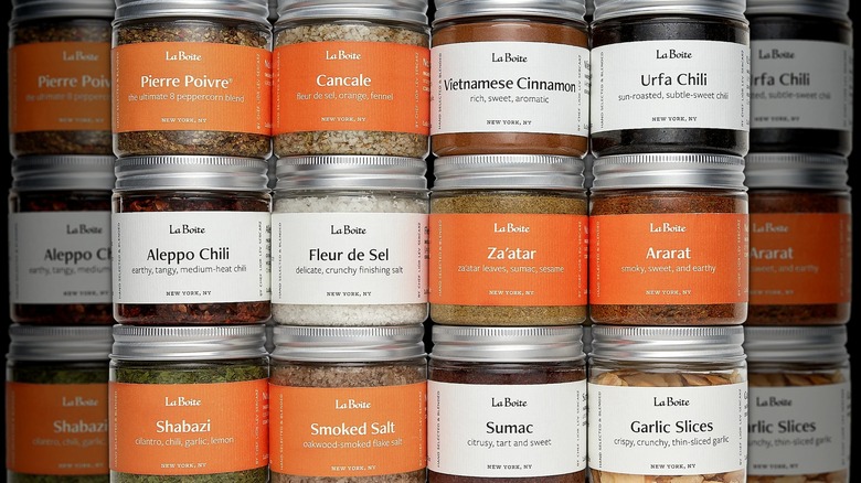 three rows of La Boîte spices in jars