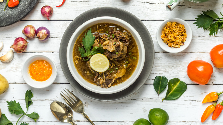 Oxtail soup in white bowl