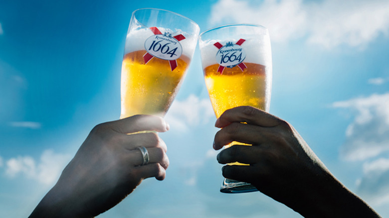 cheers with Kronenbourg 1664