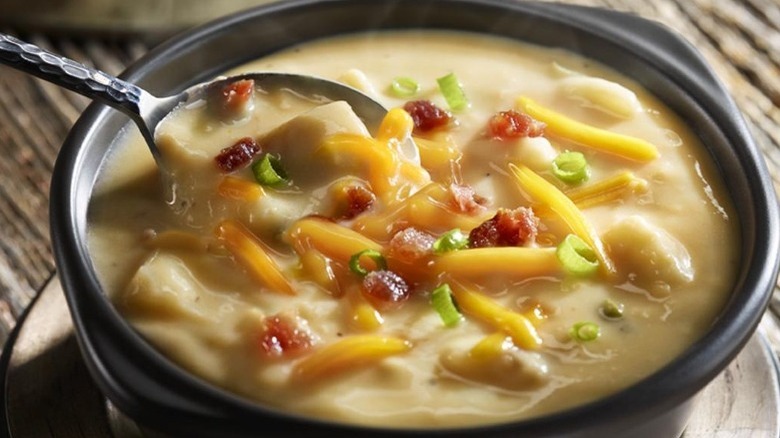loaded potato soup with spoon