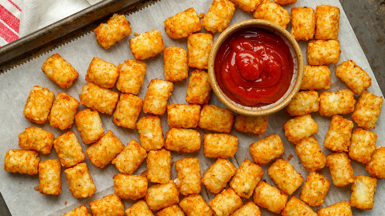 Tater tots on baking sheet