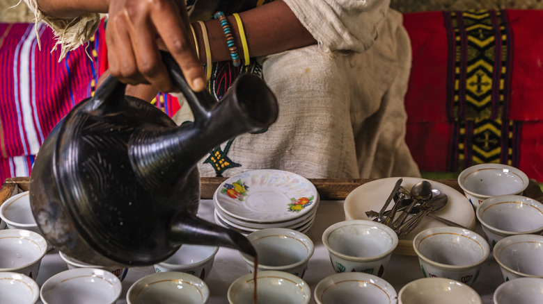 pouring Ethiopian coffee