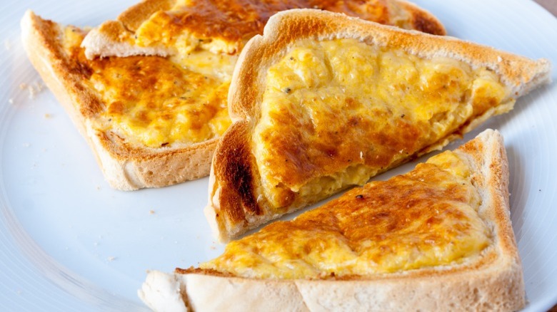 Welsh rarebit slices on plate