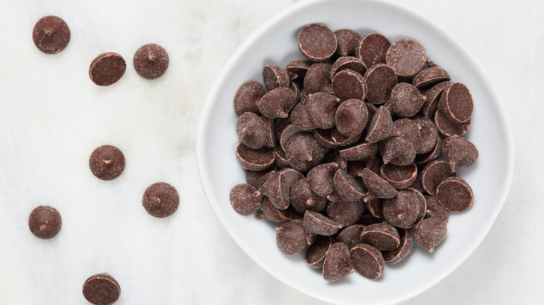 White bowl full of mini chocolate chips