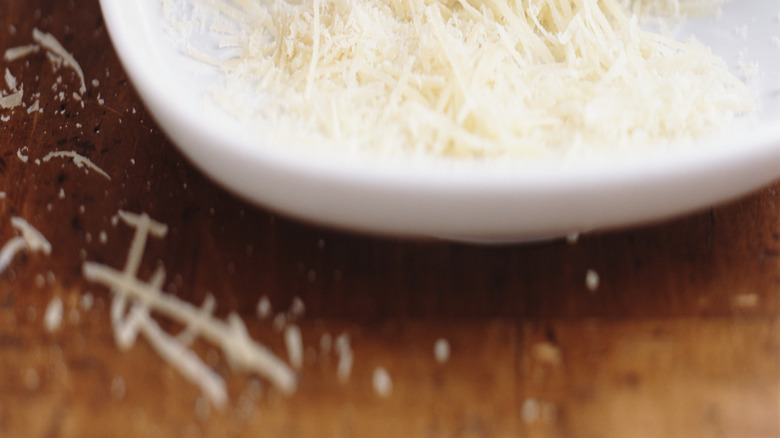 Grated Parmesan cheese on plate