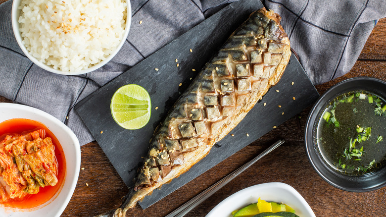 Plate of broiled mackerel with sides 