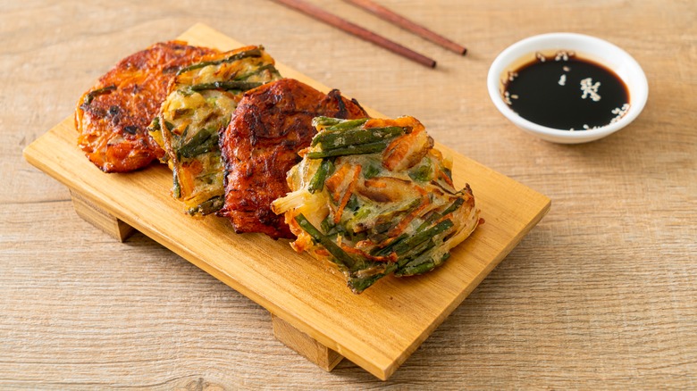 Sliced pajeon on wood plate 