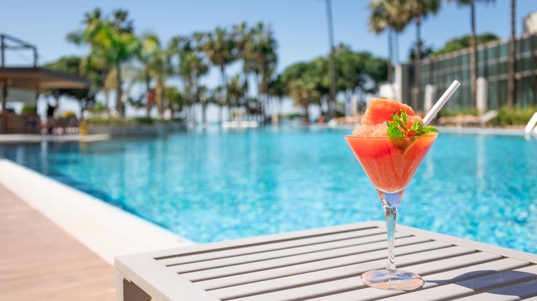 frozen cocktail beside resort pool