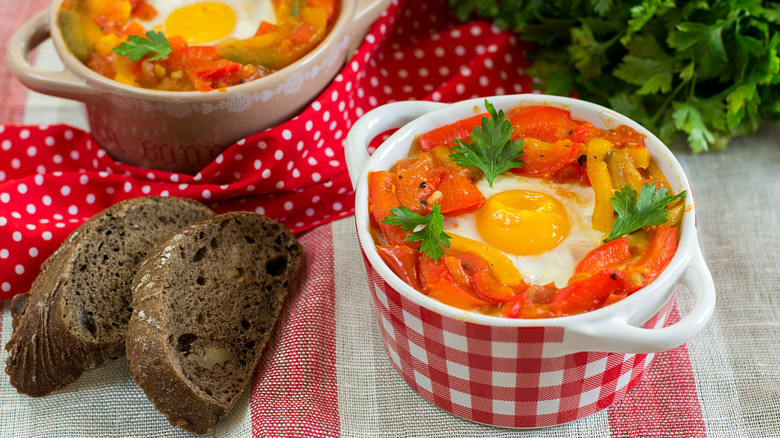 Eggs piperade in tiny dishes