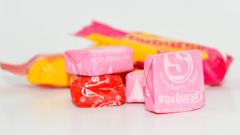 Starburst candies on white background