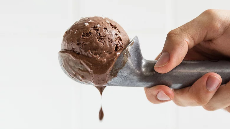 scooping chocolate ice cream