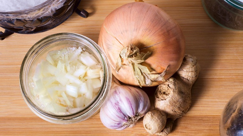 onion, ginger, and garlic on table