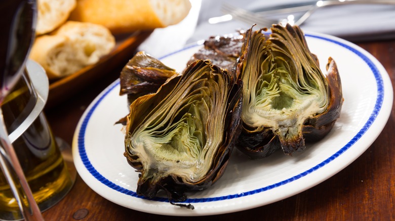 grilled artichokes on plate