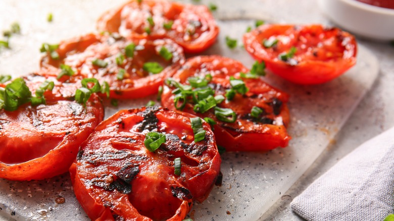 grilled tomatoes on board