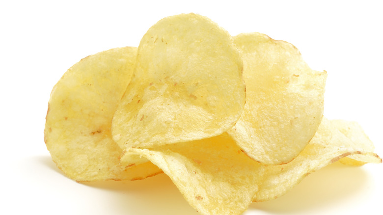 Potato chips on white background