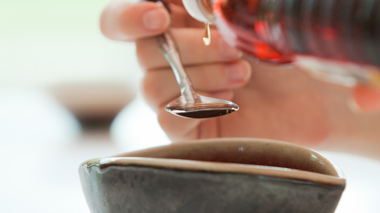 Fish sauce on spoon