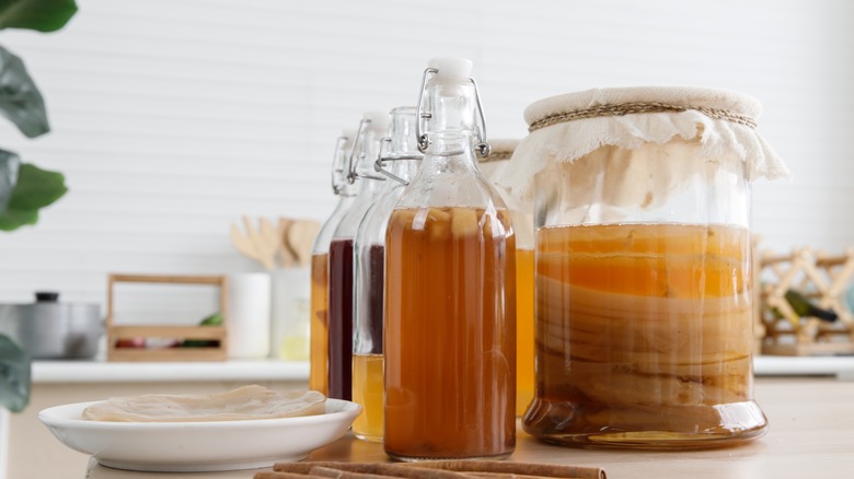 Bottles and jar of kombucha