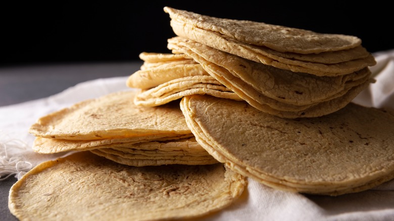 stack of tortillas in towel 