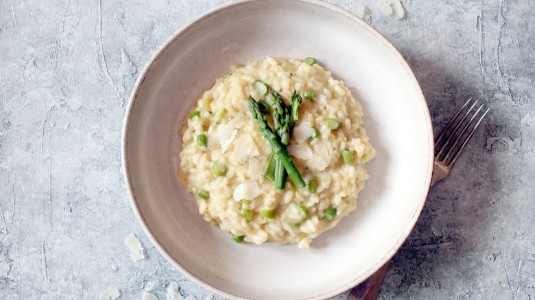 Risotto in dish with fork 