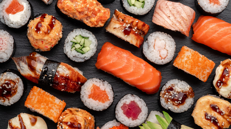 Assorted sushi on slate board 