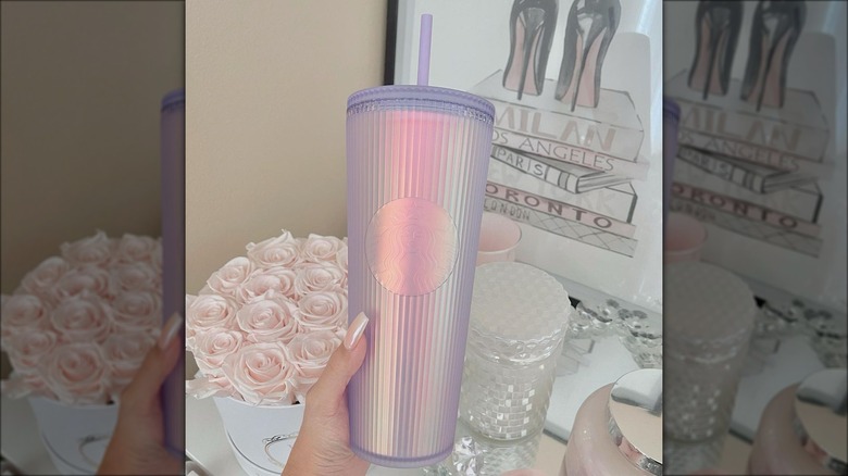 handheld Starbucks lilac iridescent tumbler