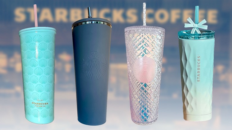 four Starbucks tumblers lined up