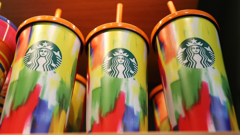 Starbucks rainbow tumblers on shelf