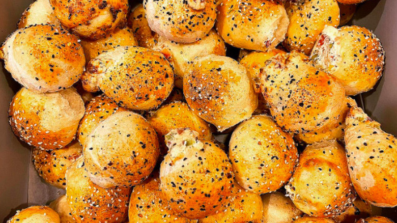 Everything bagel bombs in brown tray