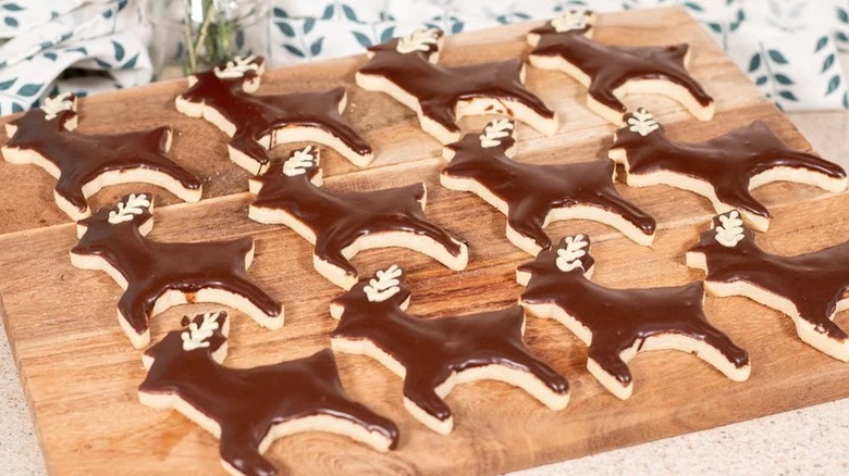 reindeer cookies on a cutting board