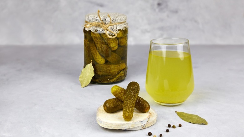 pickle jar and glass of pickle juice