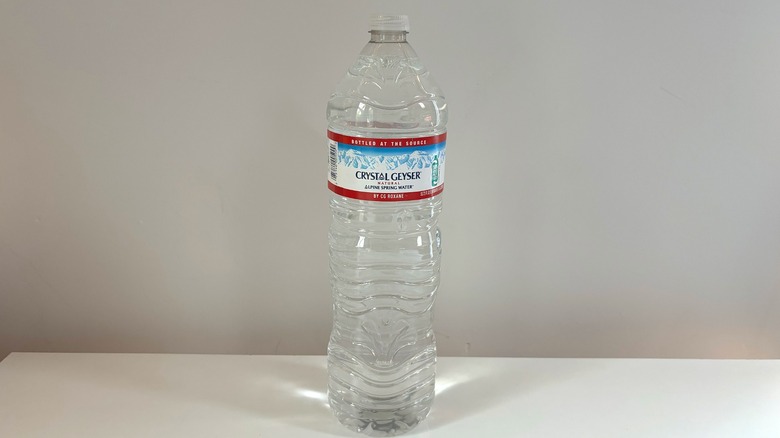 crystal geyser water bottle on table