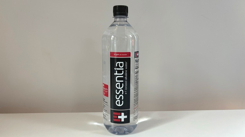 bottle of essentia water on table