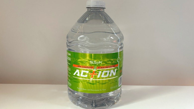 bottle of action water on table