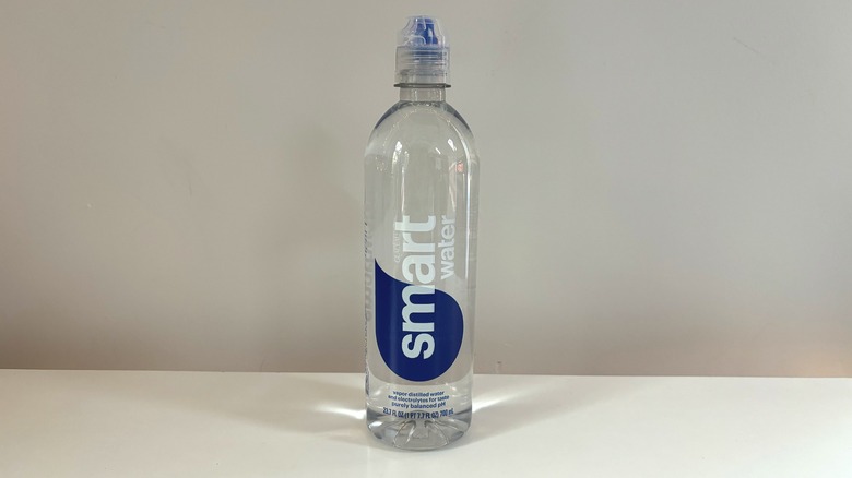 bottle of smart water on table