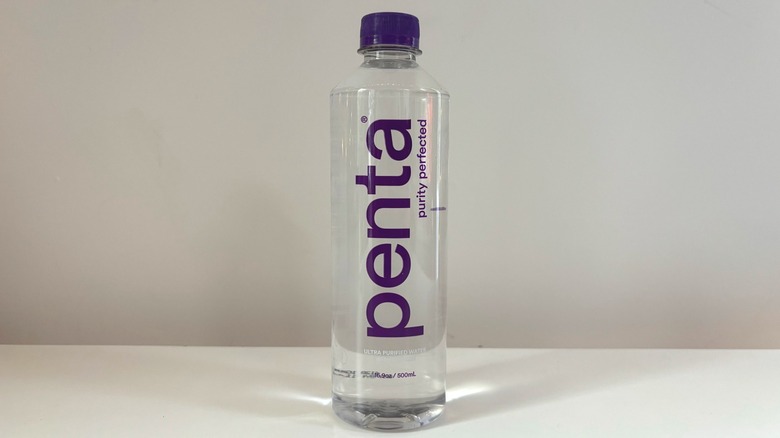 penta water bottle on table