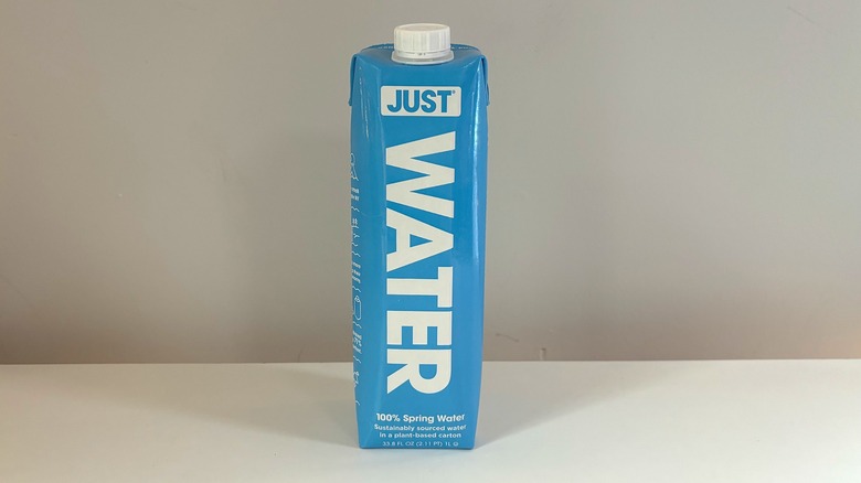 blue box of just water on table