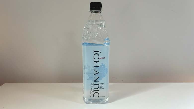 icelandic glacial water bottle on table