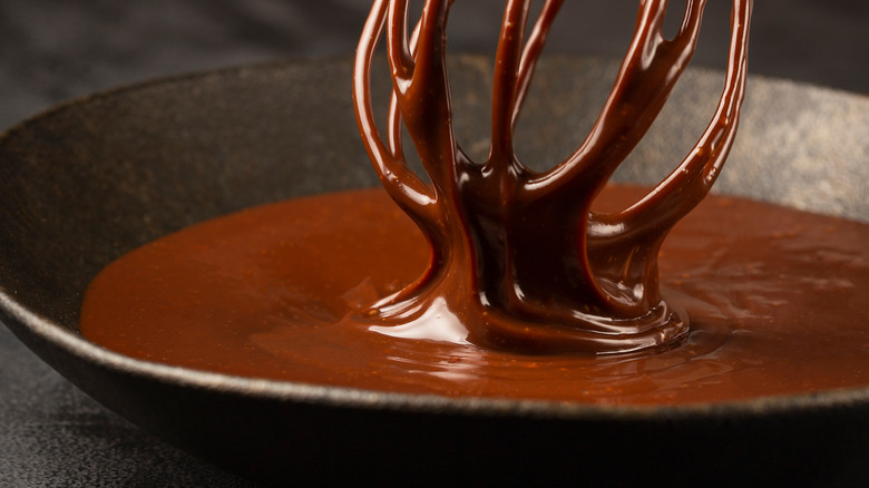 Chocolate ganache with whisk