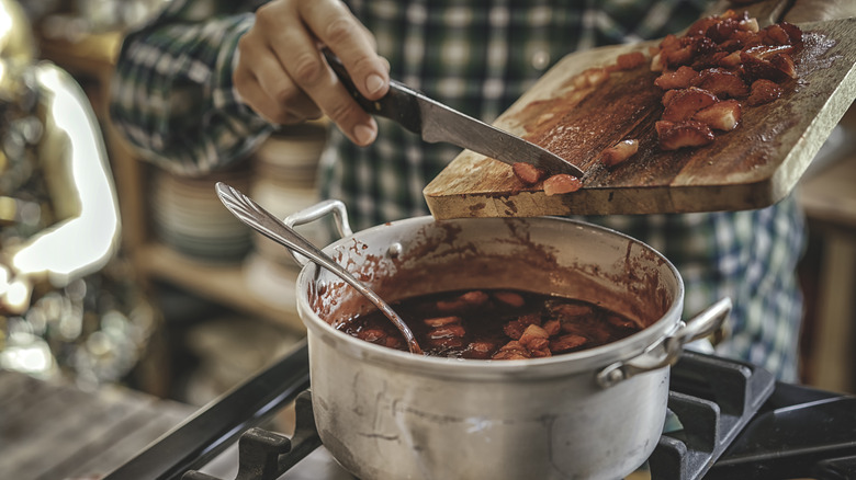 Strawberry jam cooking on stove