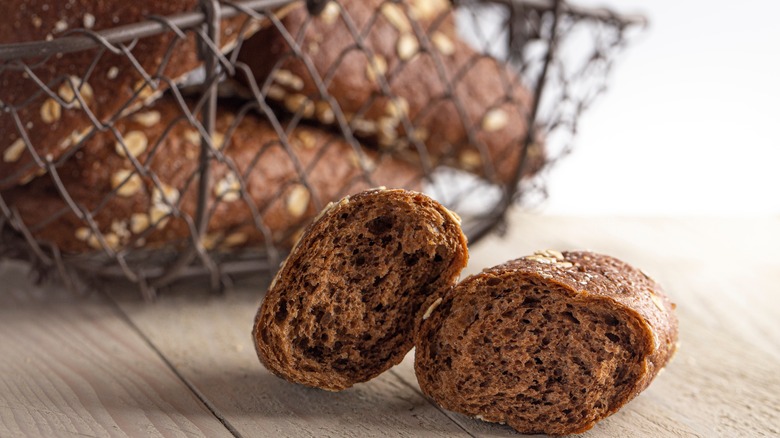 Brown bread buns on table