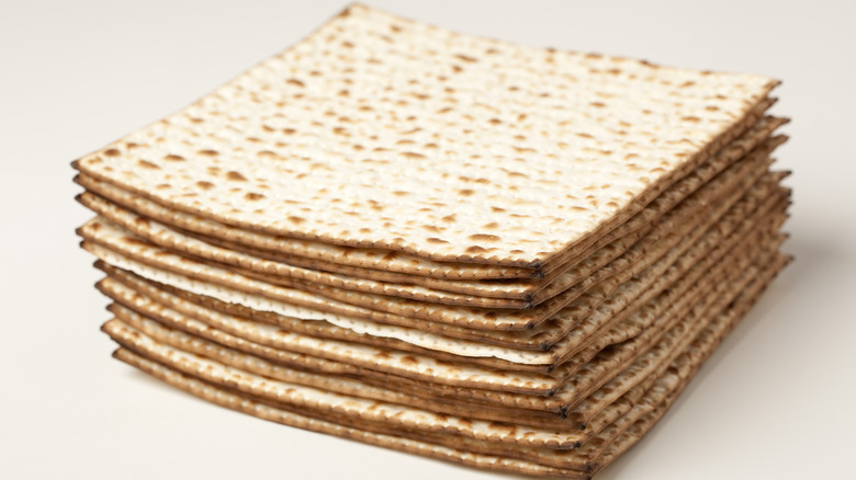 Matzo stacked on white background